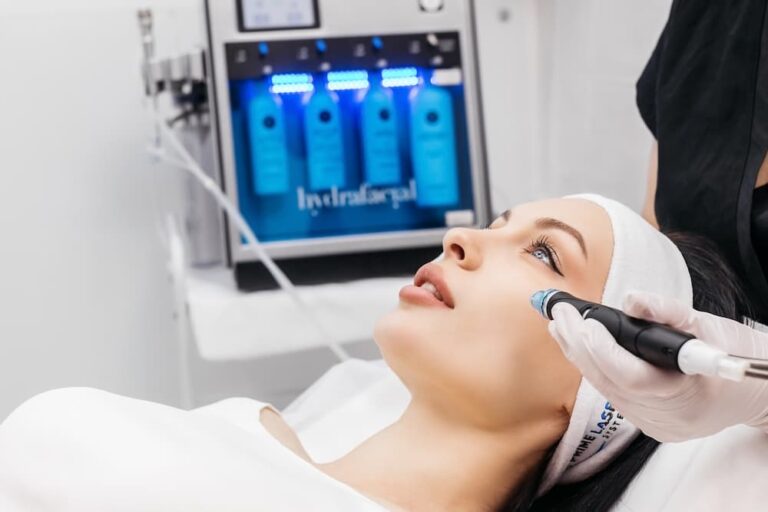 Patient receiving a HydraFacial in West Palm Beach at Body+Beauty Lab, where advanced treatments cleanse, exfoliate, and hydrate the skin.